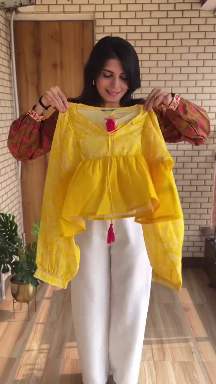 Magenta Printed Peplum Top with White Wide-Leg Trousers