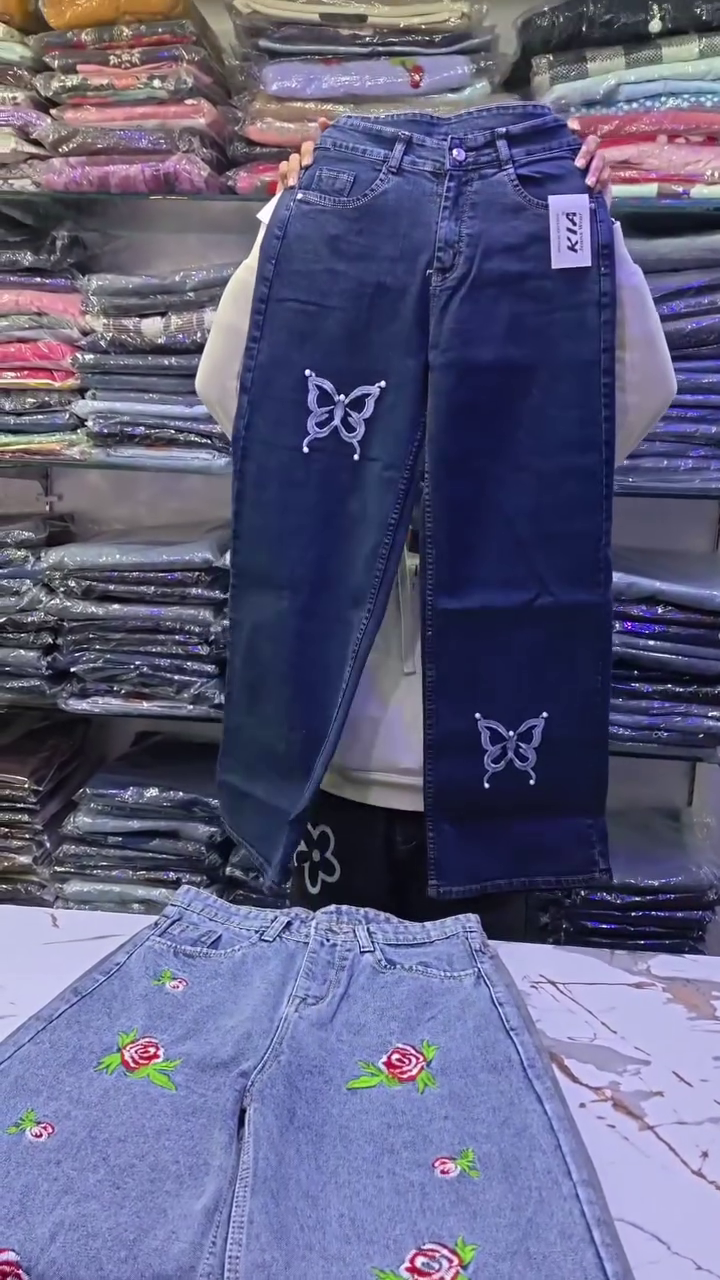 Elegant Pink Printed Peplum Top Styled with White Wide-Leg Trousers