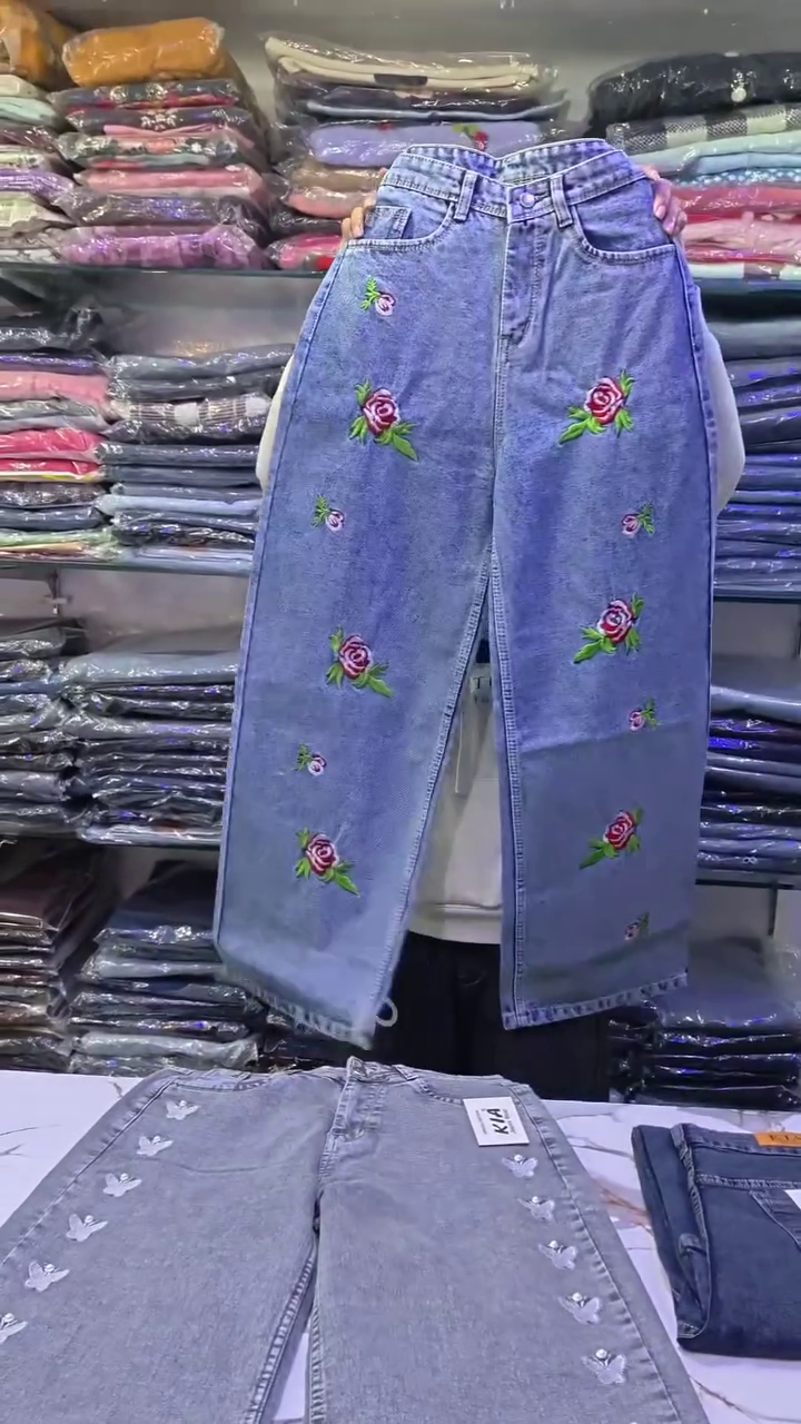 Elegant Pink Printed Peplum Top Styled with White Wide-Leg Trousers