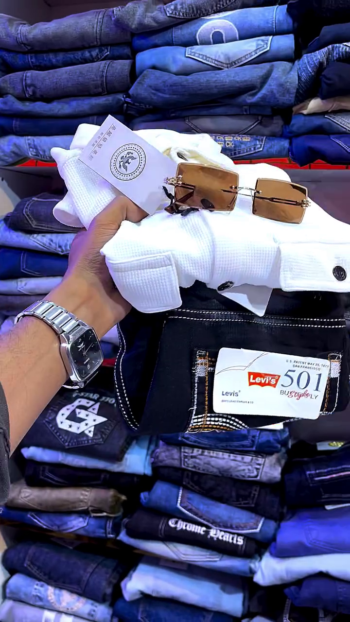 White Textured Shirt with Black Jeans, Sunglasses, and Accessories