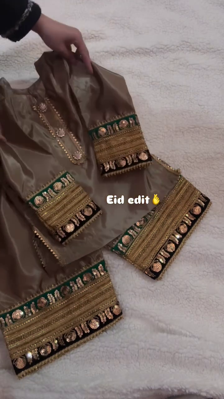 Luxurious Traditional Eid Outfit with Golden Embroidery and Elegant Design