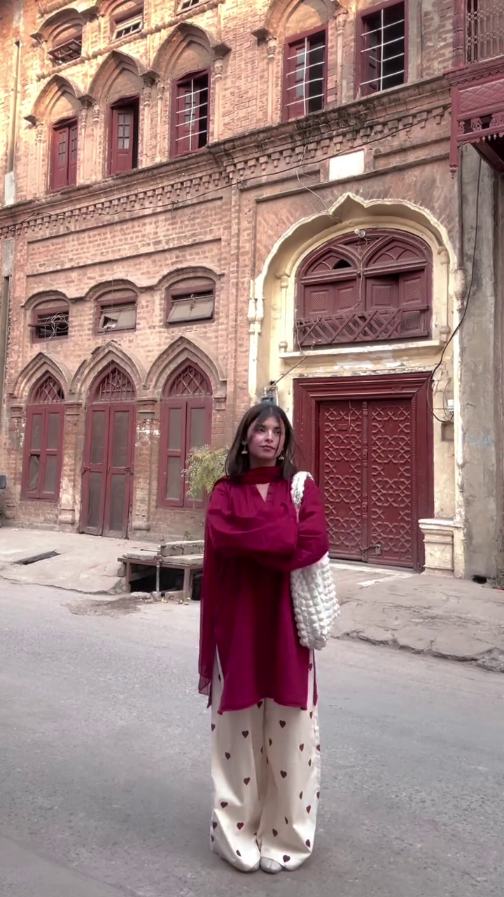 Bold Crimson Kurta with Playful Heart-Print Trousers – A Fusion of Heritage and Modern Style