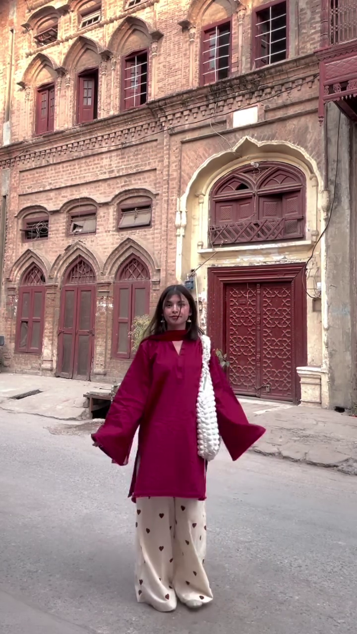 Bold Crimson Kurta with Playful Heart-Print Trousers – A Fusion of Heritage and Modern Style