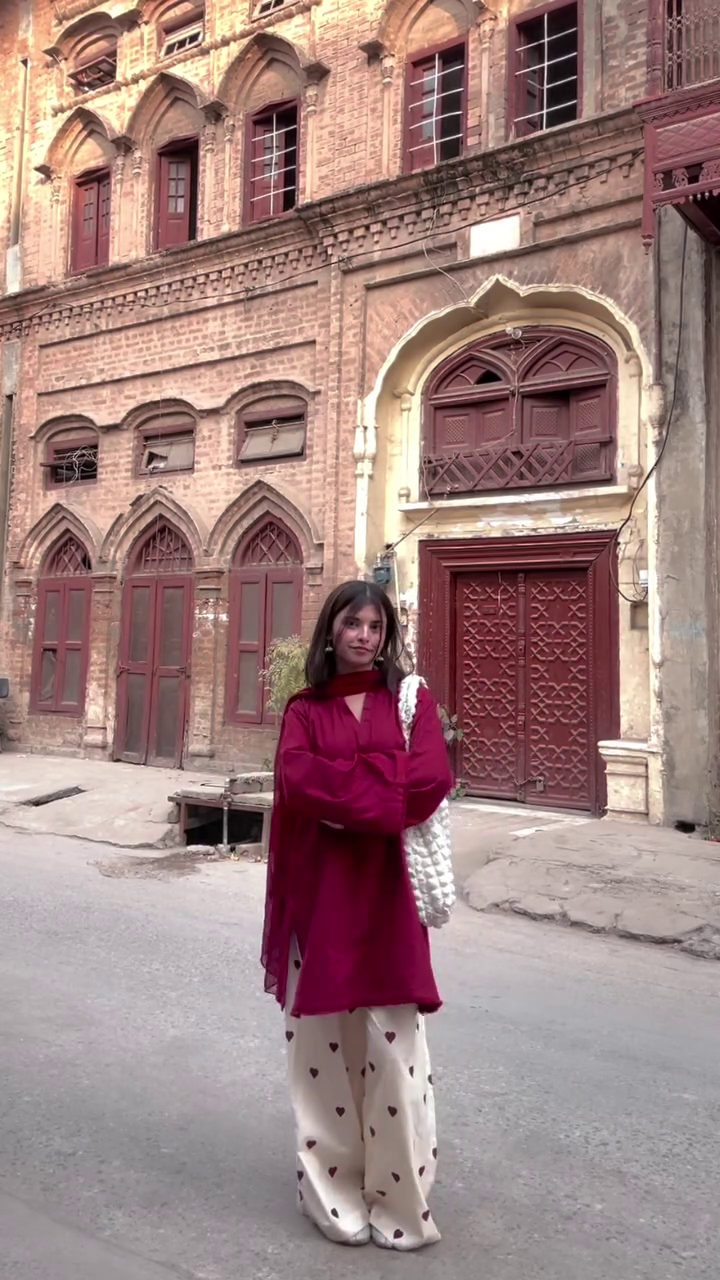 Bold Crimson Kurta with Playful Heart-Print Trousers – A Fusion of Heritage and Modern Style