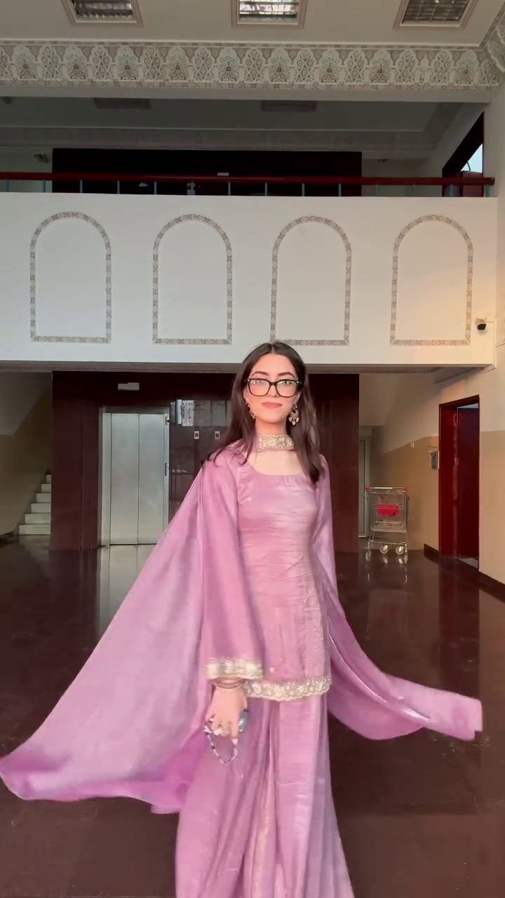 Graceful Mauve Traditional Suit with Elegant Embroidered Details