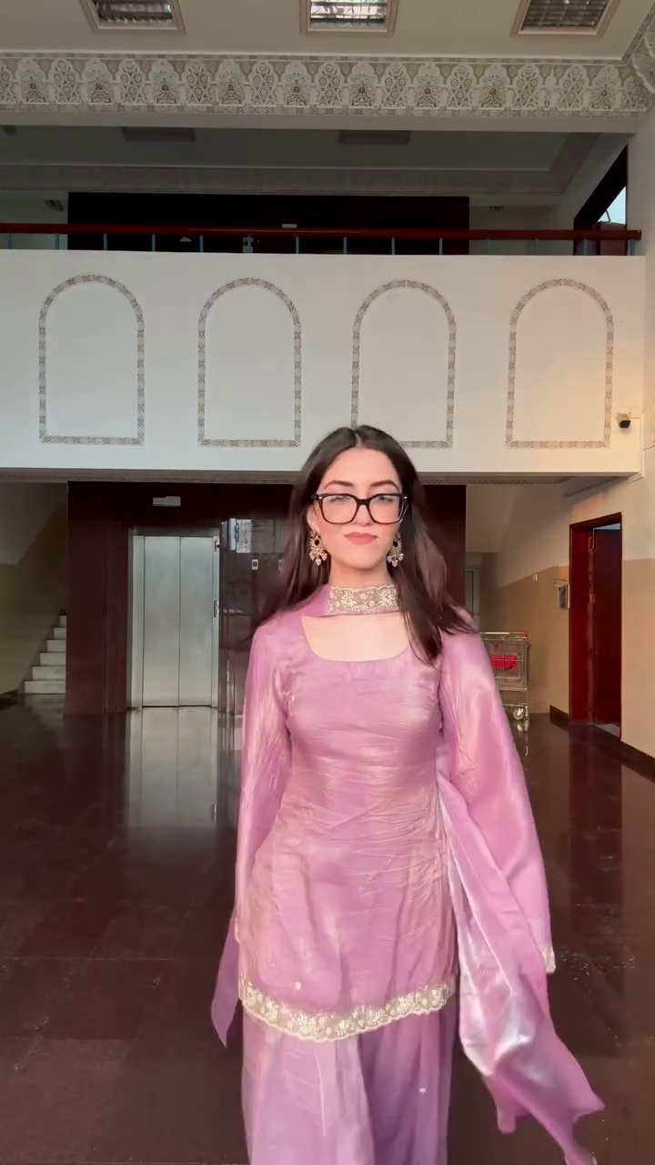 Graceful Mauve Traditional Suit with Elegant Embroidered Details