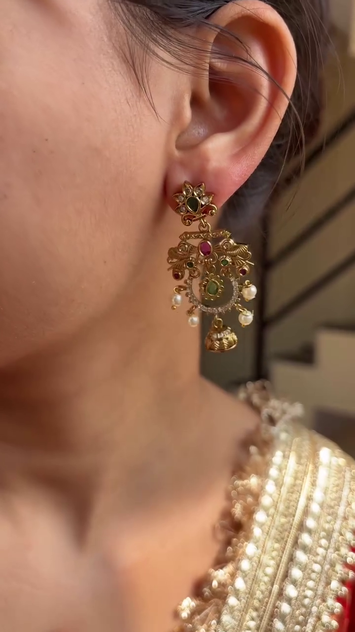 Regal Pearl Chain Earrings with Vintage Portrait Detailing