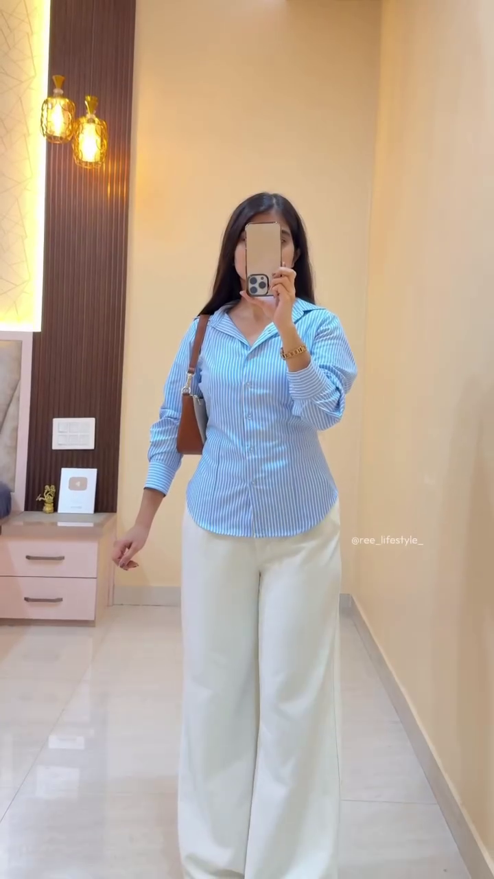 Chic Blue Striped Shirt with Classic White Trousers