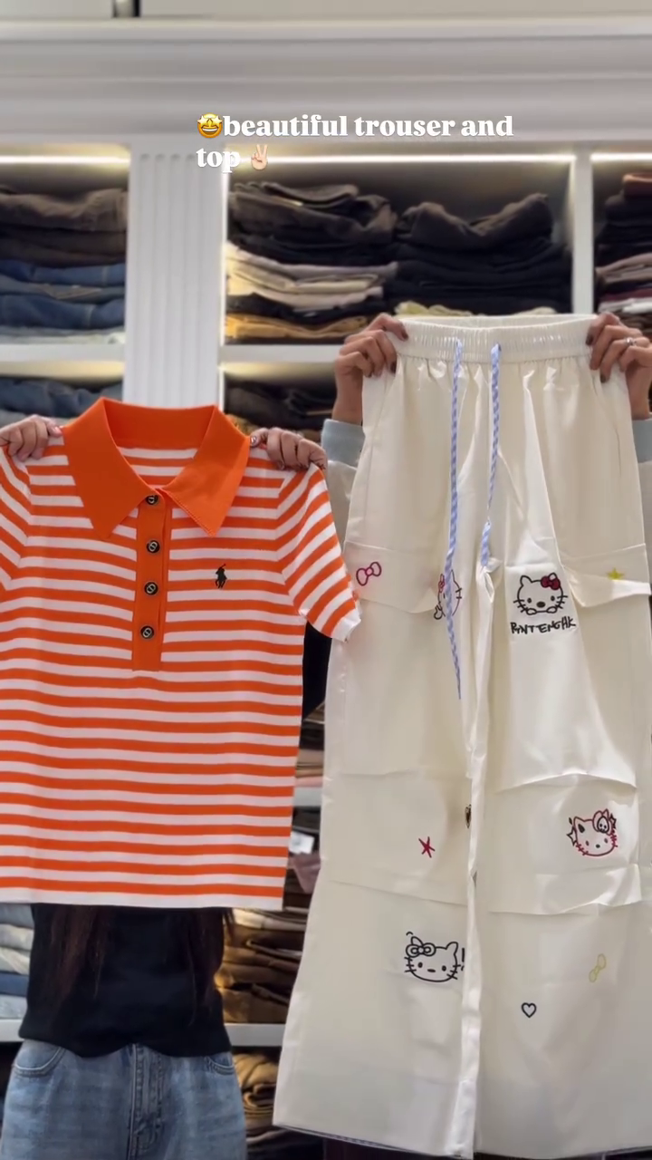 Playful Printed White Trousers with Classic Black Polo Top