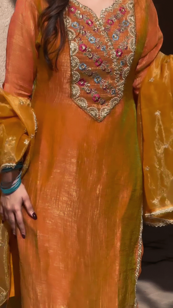 Premium shimmer tissue zari detailing suit set in orange